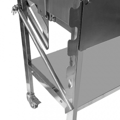 Outdoor barbecue with wind deflector stainless steel Cyprus-style rotisserie barbecue grill.